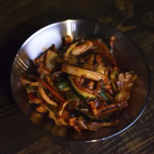 a bowl of stir fried tofu