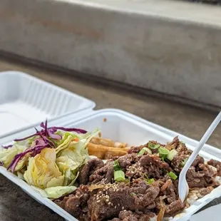 a take out container of food