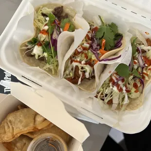 Bulgogi , spicy pork, spicy chicken tacos + Gyoza