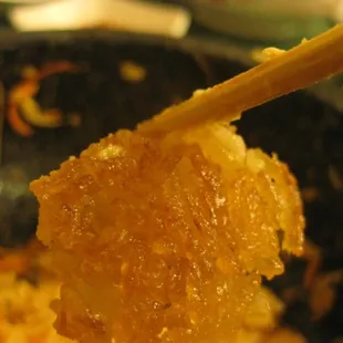 The browned, crunchy rice bits that form on the bottom of the bowl are indicitive of great bibimbap!