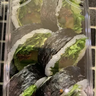 a tray of sushi rolls