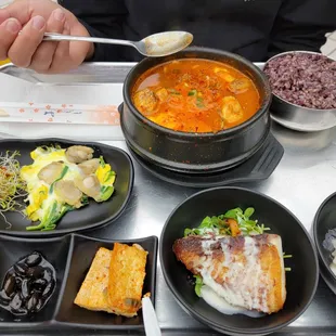 Dazzle Han  Tofu soup with side dishes