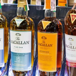 a row of bottles of alcohol