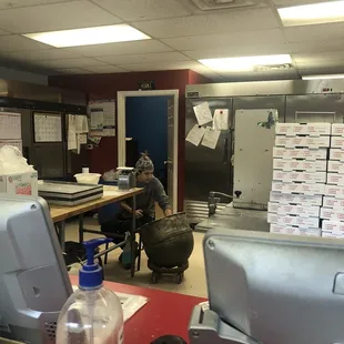 a man working in a kitchen