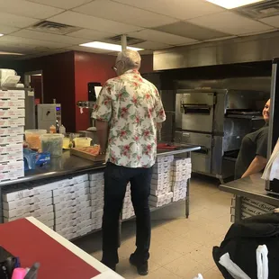 a man standing in a kitchen