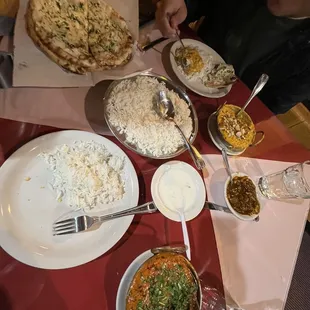 Butter chicken, Garlic naan, Korma Sutra Korma vegetable dish