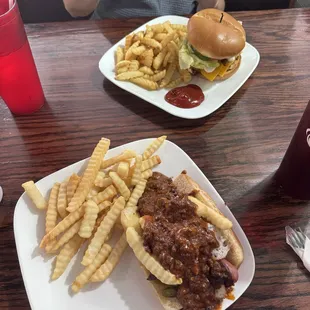 Horseshoe hot dog and fries. Chicken Avocado and bacon ranch sandwich with fries.   Very tasty!