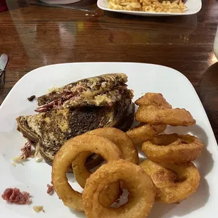 Ruben on rye with onion rings.