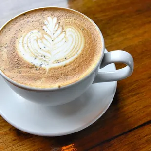 a cup of coffee on a saucer