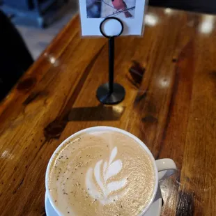 a cup of coffee on a table