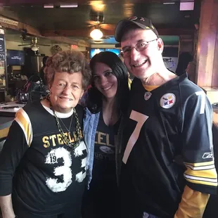 a man and two women posing for a picture