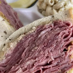a corned beef sandwich and macaroni salad