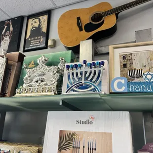 a guitar on a shelf