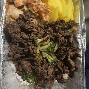 Bulgogi with kimchi, daikon, and broccoli