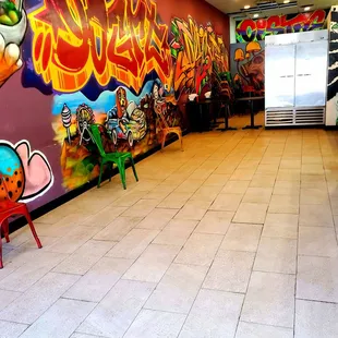 a colorful mural on the wall