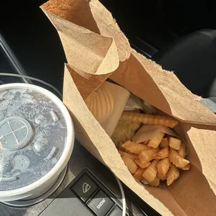 Cheese burger with fries and soda