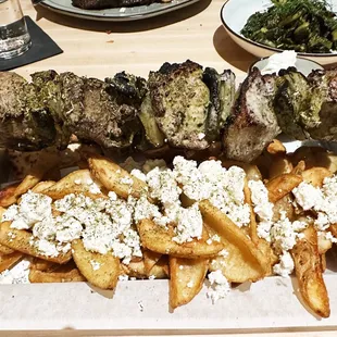 Pork Skewers with Greek fries, grilled pita and tzatziki sauce