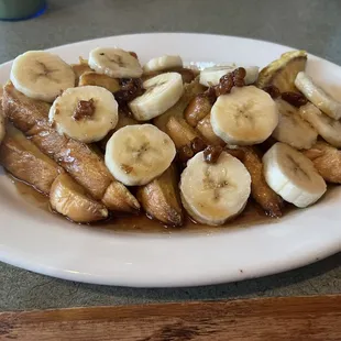 a plate of bananas and walnuts