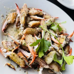 a plate of crab and potato salad