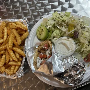 Chicken Suvlaki Sandwich deal includes a salad and a drink. Fries are ordered separate.