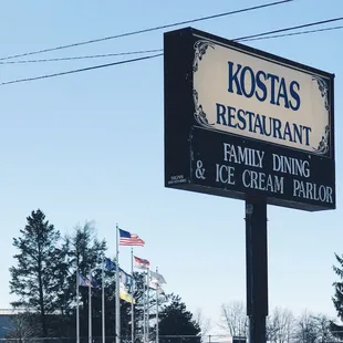 a sign for a family dining and ice cream parlor
