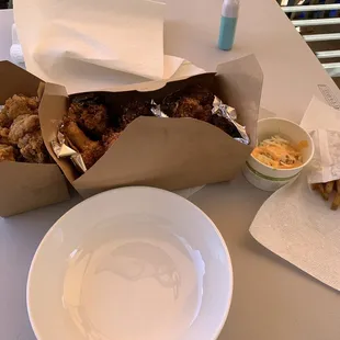 Large order of chicken with depressing portion of sides