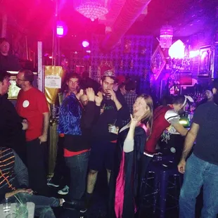 a group of people in a bar