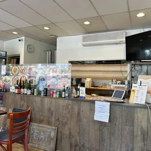 Inside. Counter to order take out but you can also dine inside.