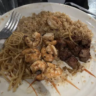 Steak and shrimp hiabachi with fried rice and noodles.