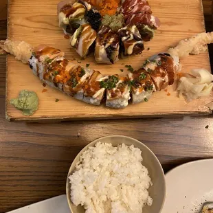 a plate of rice and a bowl of broccoli