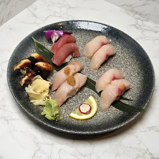 Blue Fin Tuna, Garlic Albacore, Hamachi, Unagi.