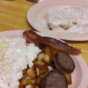two plates of breakfast food