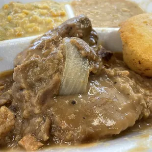 Smothered Pork Chop.  Northern Beans.  Kountry Korn.  Greasy goodness.  Can't eat here too much.  End up like Wilford Brimley.