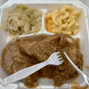 Smothered pork chops. They were so tender I didn't need the knife.