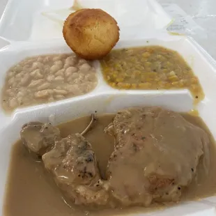 Smothered Pork Chop.  Northern Beans. Corn.  Cornbread.