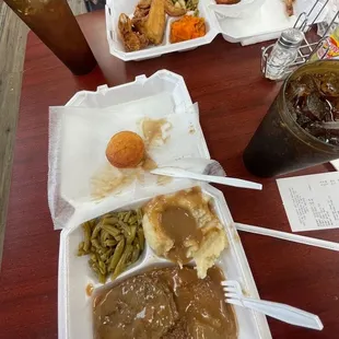 Hamburger steak Chicken wings Creamy potatoes Green beans Candied yams