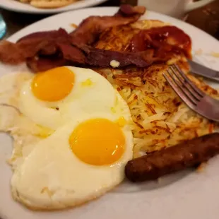 Eggs,sausage,hashbrown,bacon breakfast off favorite menu