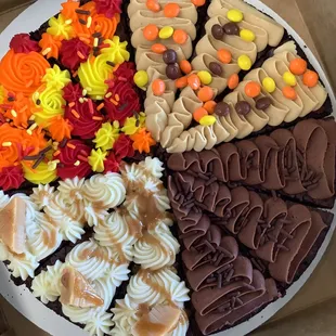 Fall Brownie Cake: Vanilla icing, caramel icing, chocolate icing, peanut butter icing