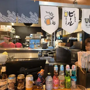 a woman behind the counter