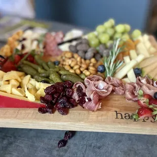 a platter of fruit and cheese