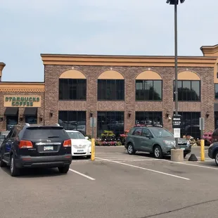 cars parked in front of the store
