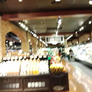 a blurry image of a grocery store