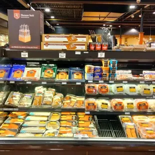 a display of cheeses and pastries
