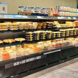 a display of cheeses and other foods