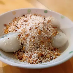 Black sesame balls with crushed peanut &amp; sugar