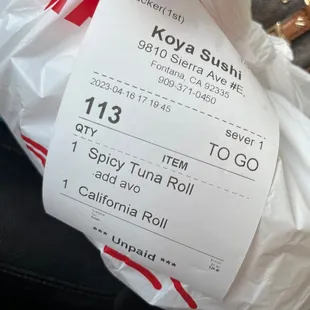 a bag of food on the seat of a car