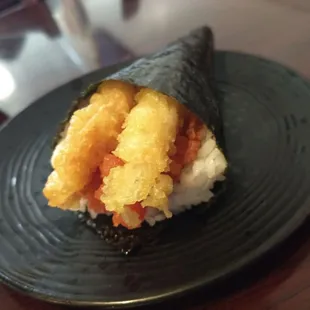 Tiger hand roll. Shrimp tempura was crunchy, spicy Tuna was tasty. But maaaan, that&apos;s a lot of rice in there:(