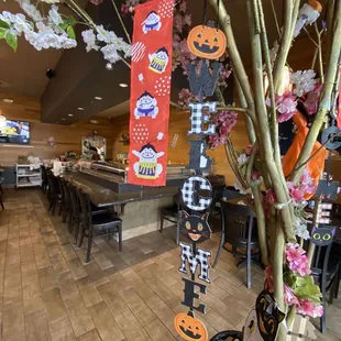 a decorated tree in a restaurant