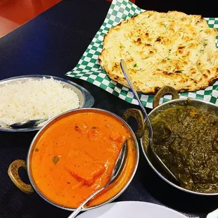 Garlic Naan and Butter Chicken along with Chicken Saag