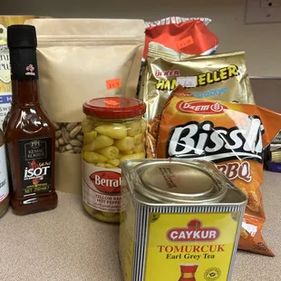 Turkish coffee, bbq chips, savory biscuits, sunflower seeds, pistachio, hot sauce, and mulberries